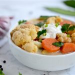 cauliflower soup with carrots and vegan sourcream on top
