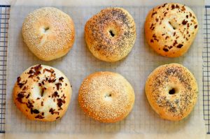 6 bagels with poppyseeds, sesame seeds and onion