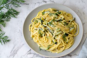 courgette spaghetti on grey plate